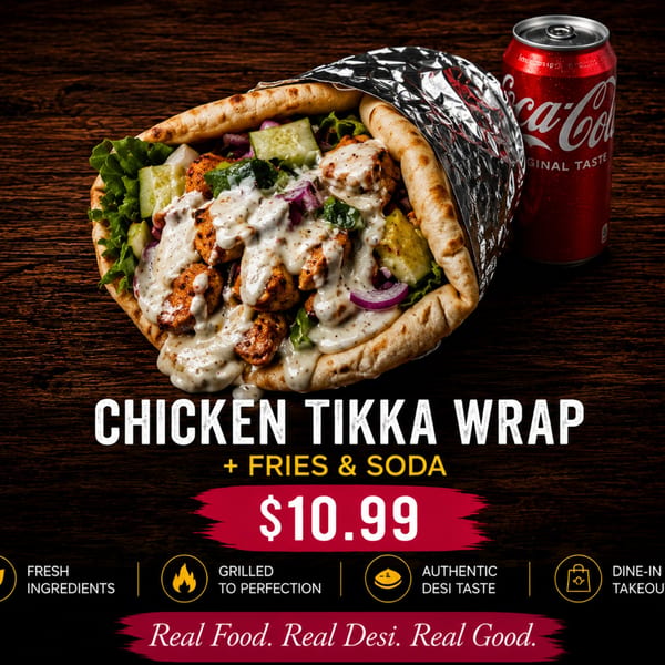 Chicken Tikka Wrap with white sauce, lettuce, cucumbers, and red onions, next to a Coca-Cola can.