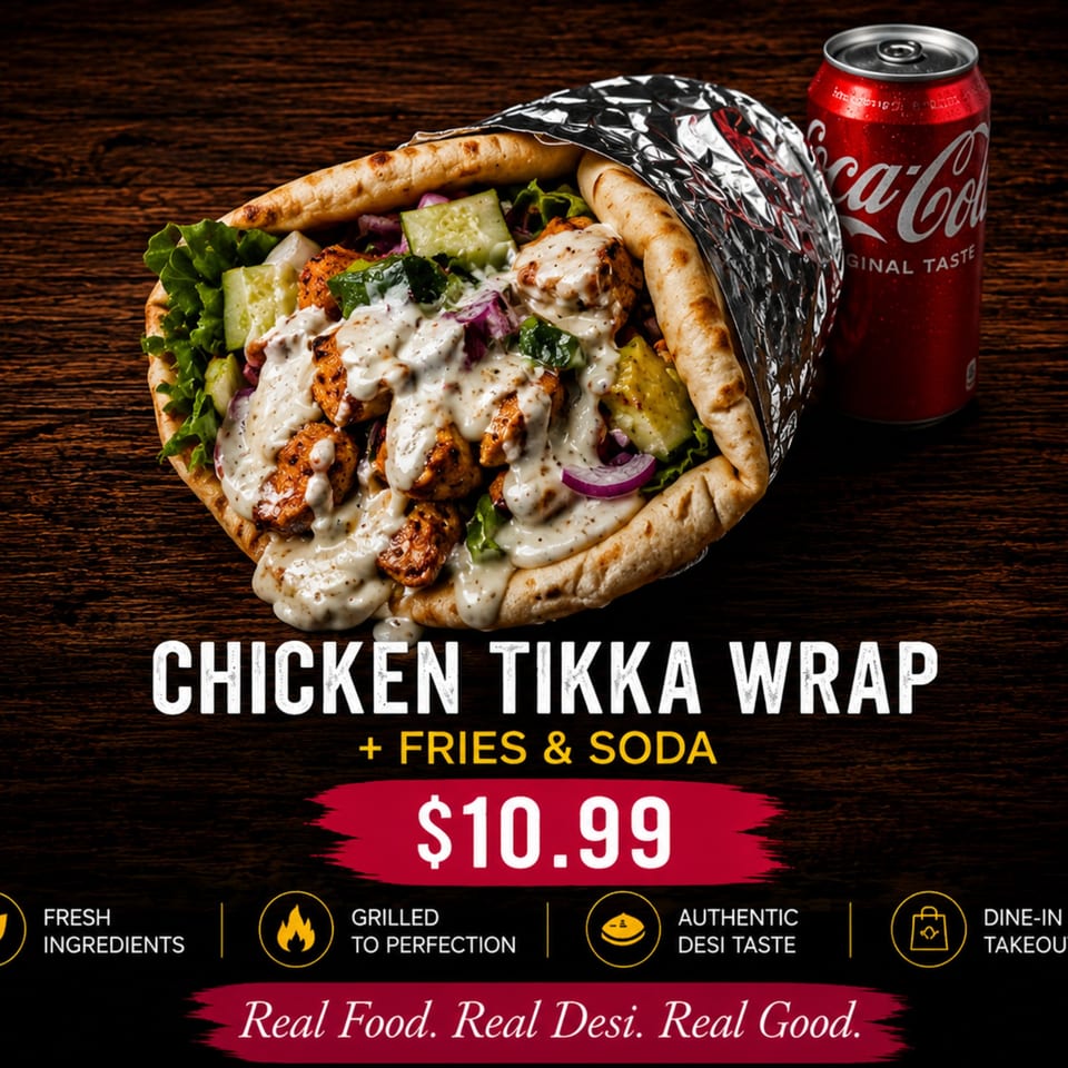 Chicken Tikka Wrap with white sauce, lettuce, cucumbers, and red onions, next to a Coca-Cola can.